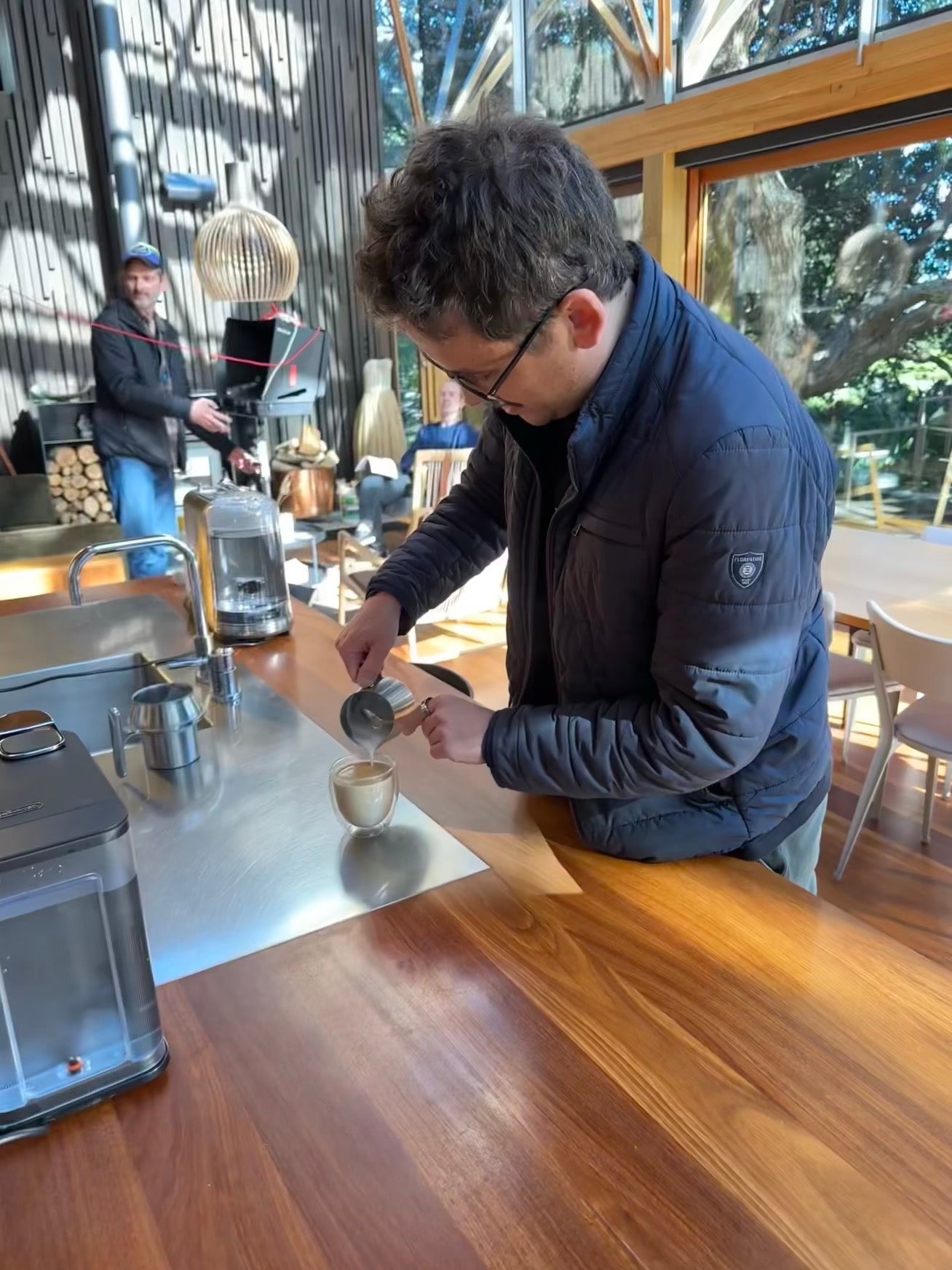 Cam whipping up coffees for the shoot